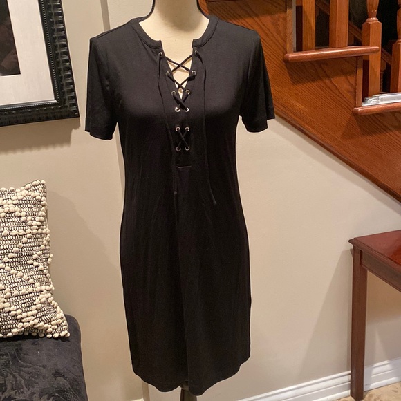 White House Black Market Dresses & Skirts - White House black-market T-shirt dress with lace up detail at neck size S